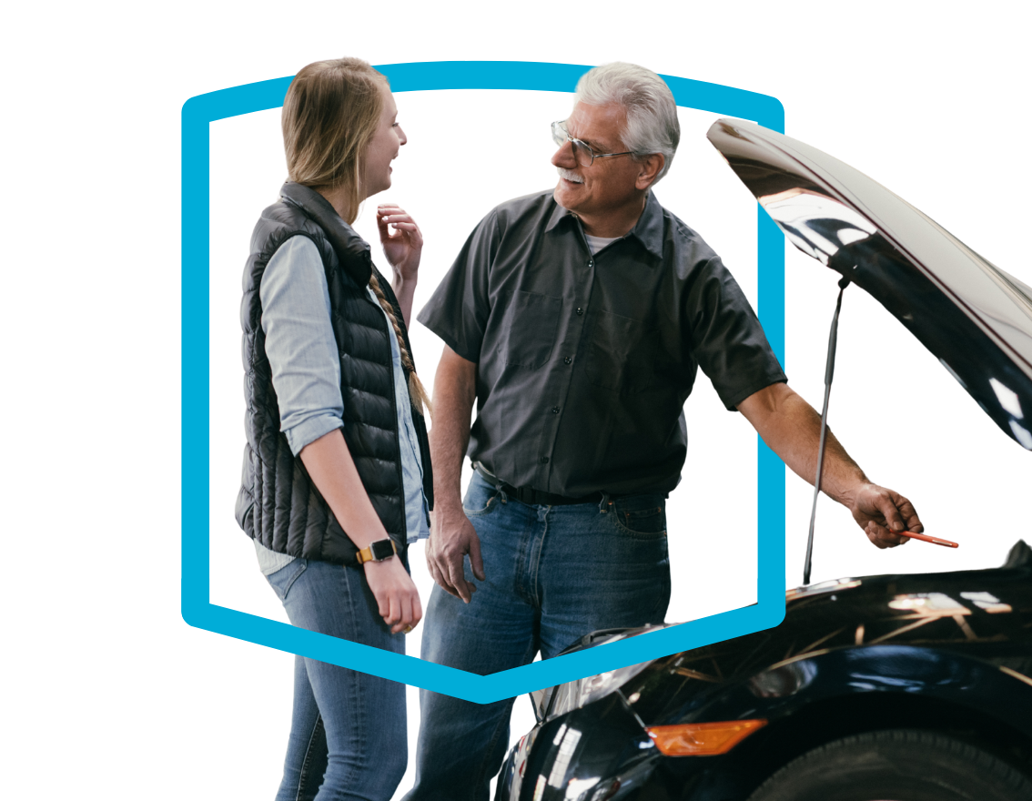Two people conversing next to an open-hood car, outlined by a blue shield.